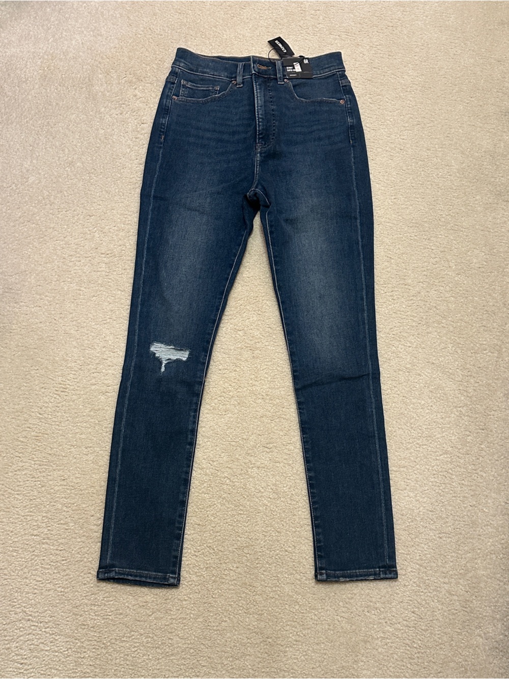 Express Women's Dark Blue Skinny Jeans with Knee Rip